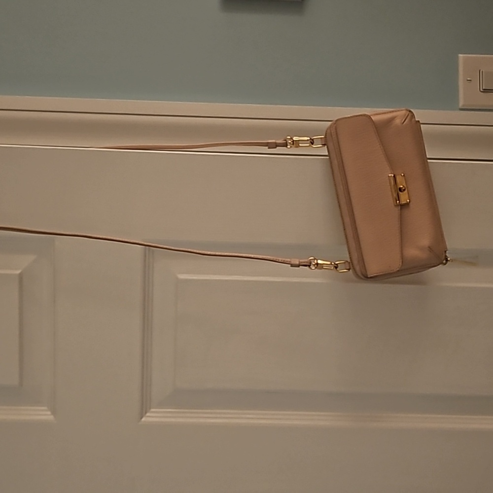 Tumi blush pink crossbody bag